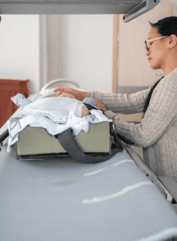 A baby getting an MRI to receive a diagnosis 